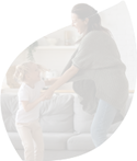 woman dancing with little girl