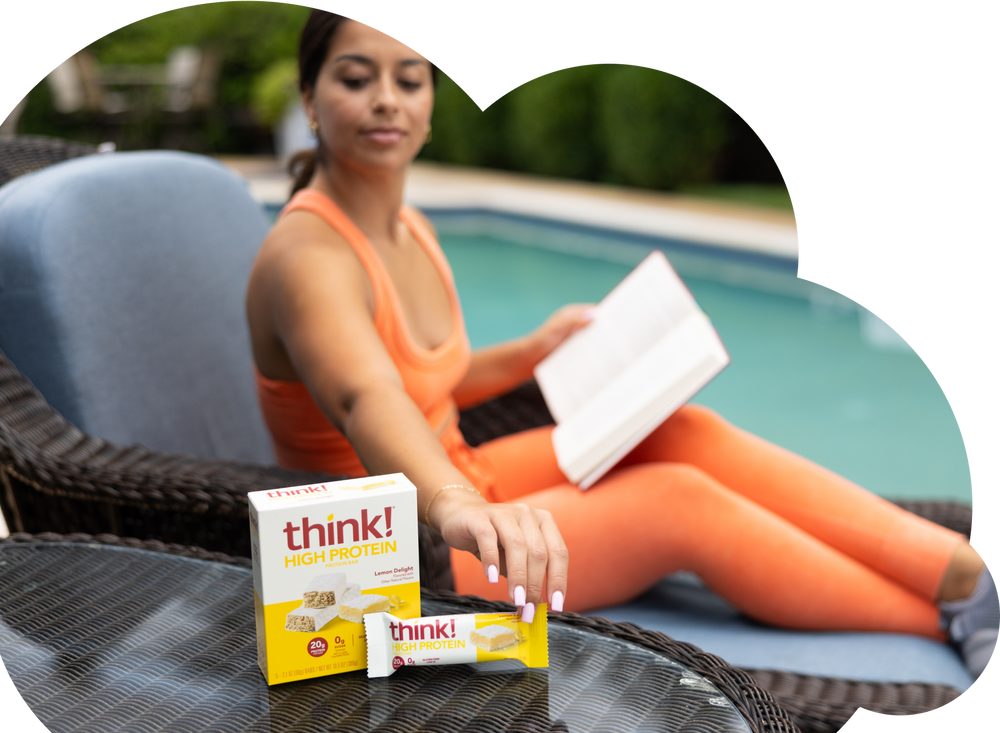 Woman with think protein bars relaxing