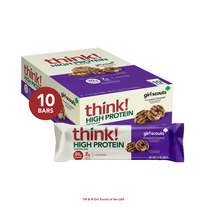 Box of think! High Protein Coconut Caramel bars. The package contains 10 bars with 20g of protein and is gluten-free. Advertises Girl Scouts flavor.